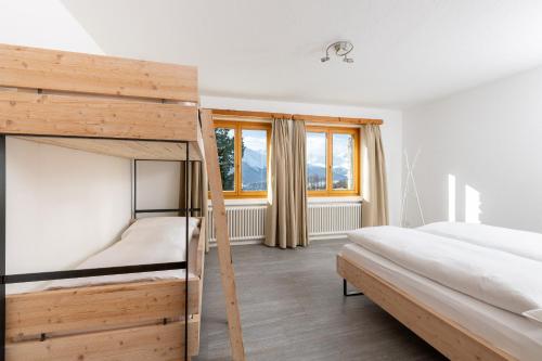 Katil atau katil-katil dalam bilik di Ferienwohnung by Randolins