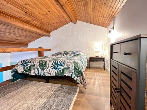 Ένα ή περισσότερα κρεβάτια σε δωμάτιο στο Les 4 Appartements au cœur de Châtellerault