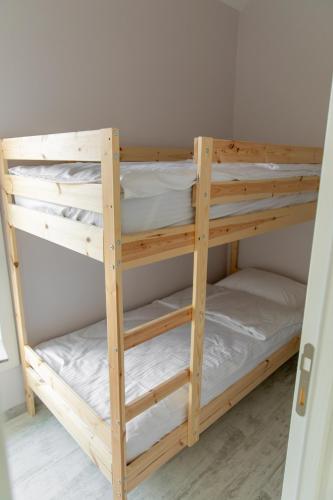 a pair of bunk beds in a room at Gadura Kır Evleri Urla in Urla