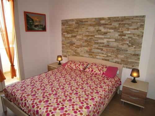 Postel nebo postele na pokoji v ubytování Cozy apartment in Gagliano del Capo 60 m² with spacious balcony