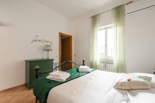Postel nebo postele na pokoji v ubytování Giava Home