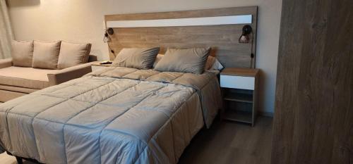 Ένα ή περισσότερα κρεβάτια σε δωμάτιο στο Quequen - Casa Las Olas