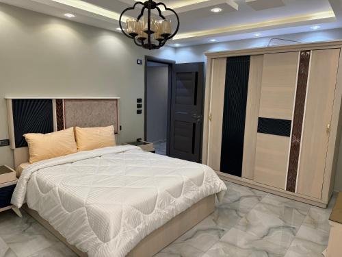 Postel nebo postele na pokoji v ubytování Cairo apartment