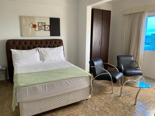 Katil atau katil-katil dalam bilik di Syros Hotel