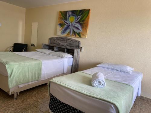 Katil atau katil-katil dalam bilik di Syros Hotel