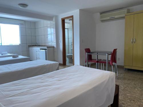 Katil atau katil-katil dalam bilik di Syros Hotel