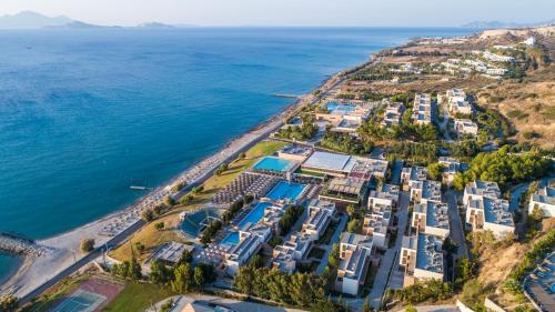 an aerial view of a resort next to the ocean at Atlantica Mikri Poli Kos in Kardamaina