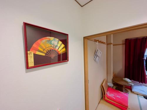 Ein Bett oder Betten in einem Zimmer der Unterkunft Rest collection Nayacho Kyoto