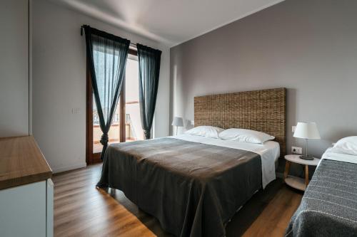 Кровать или кровати в номере Mistral Apartments