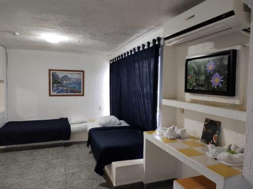 พื้นที่นั่งเล่นของ Íkaro Suites Cancún