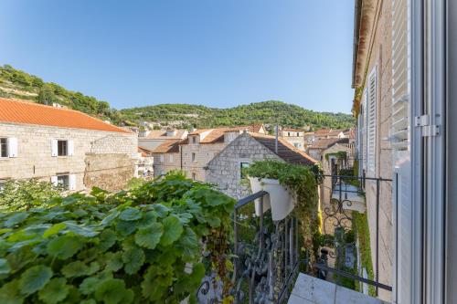 a view from a balcony of a city at Hotel San Giorgio in Vis