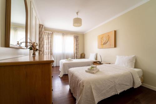 Postel nebo postele na pokoji v ubytování Marinhas Esposende - Moradia V4 com piscina junto à praia by House and People