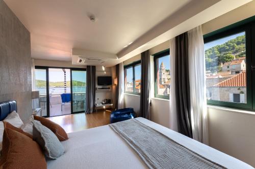 Postel nebo postele na pokoji v ubytování Hotel San Giorgio