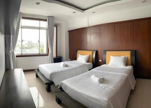 Кровать или кровати в номере SOCHU HOUSE- Tuần Châu Homestay & Coffee