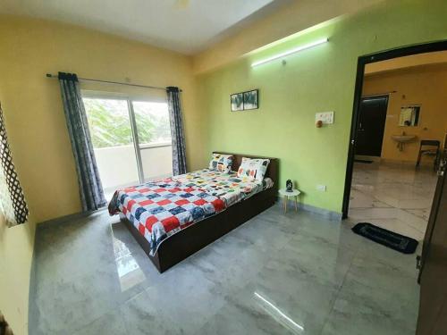 Ένα ή περισσότερα κρεβάτια σε δωμάτιο στο Entire 3bhk centrally located in Kukatpally Y Jn.