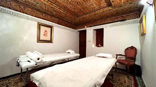 Riad Damia Suite & Spaにあるベッド