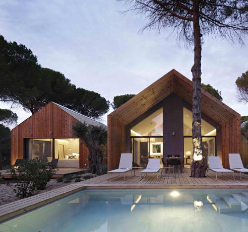 a house with a pool in front of it at Sublime Comporta Country Retreat & SPA in Comporta