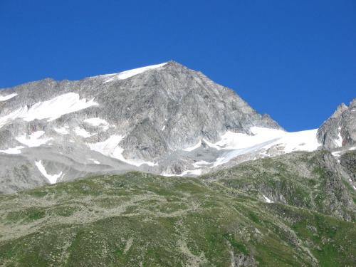 a mountain with snow on top of it at Cafe Schneider in Lappago