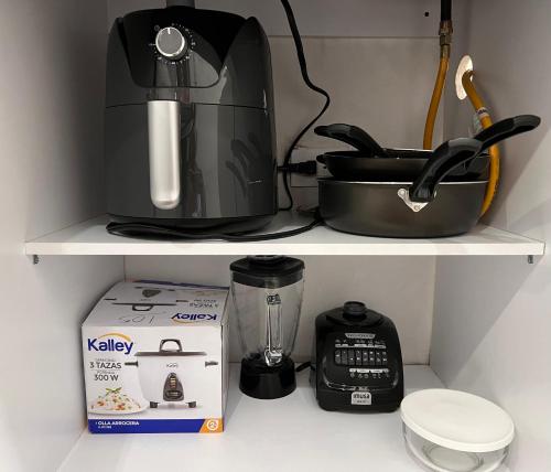 Kemudahan buat kopi dan teh di Moderno comodo y tranquilo apartamento