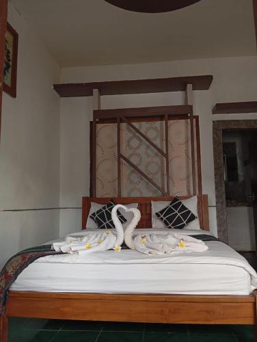 Katil atau katil-katil dalam bilik di Wahyu Gili 1