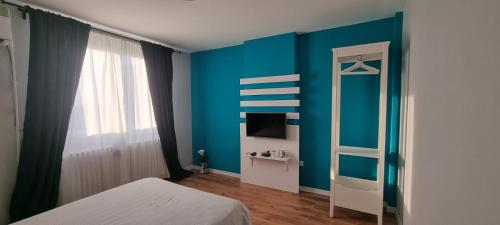 Postel nebo postele na pokoji v ubytování Art d'aimer