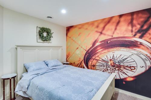 a bedroom with a wall mural of a bicycle at Smethport Vacation Rental with Fireplace and Lake View 