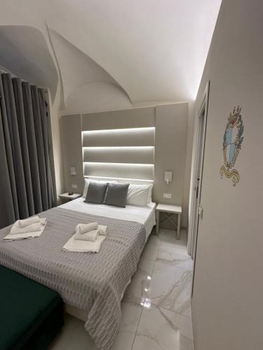 Ένα ή περισσότερα κρεβάτια σε δωμάτιο στο That's Amore Accommodation Tropea