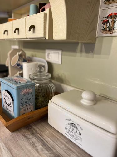 a shelf with a toaster and a box of food at 1957 To Rodo kai to Roido in Karpenision