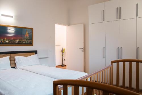 Cama o camas de una habitación en Ivana Suite Levico Terme