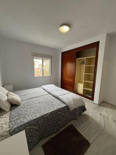 Ένα ή περισσότερα κρεβάτια σε δωμάτιο στο Gran Chalet a 13 min de Sevilla