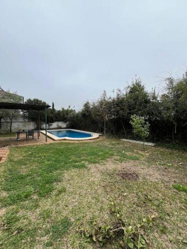 Πισίνα στο ή κοντά στο Gran Chalet a 13 min de Sevilla