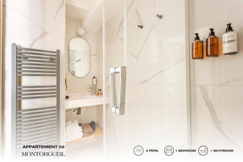 a bathroom with a shower and a sink at Beauquartier - Montorgueil in Paris