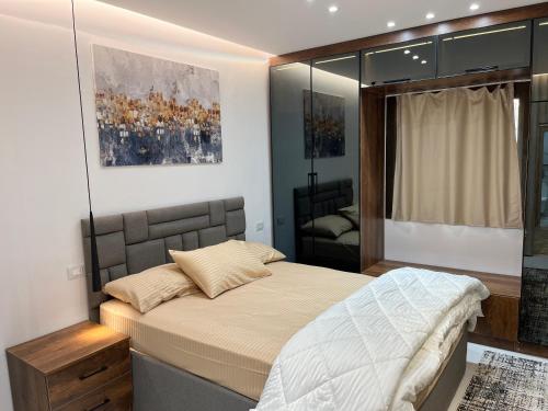 En eller flere senge i et værelse på Saif CityStars Milsa
