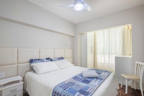 A bed or beds in a room at Apê localização perfeita na Av Atlântica