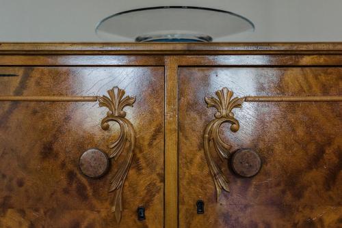 a wooden door with a light on top of it at Skäftekärr Hotell in Löttorp