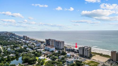 an aerial view of a city and the beach at Oasis Hotel in Myrtle Beach