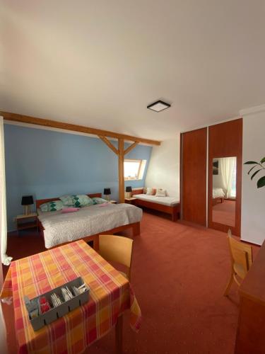 Postel nebo postele na pokoji v ubytování Penzion SLUNCE