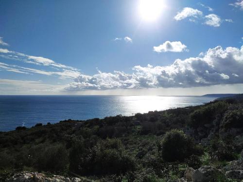 a view of the ocean on a sunny day at Casa Trekking Salento Marittima Di Diso in Marittima