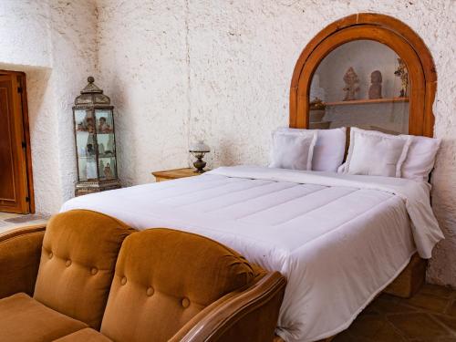 Postel nebo postele na pokoji v ubytování Hacienda La Concepción