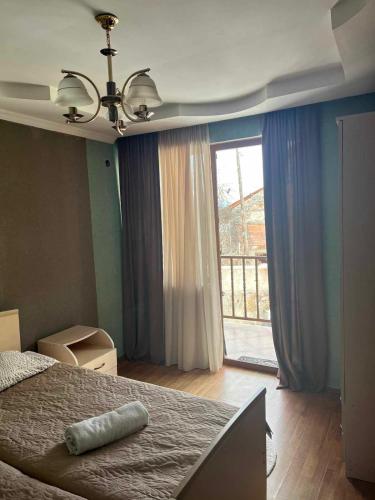 Postel nebo postele na pokoji v ubytování Sunny