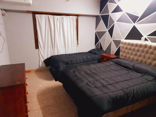 Postel nebo postele na pokoji v ubytování El Mirador