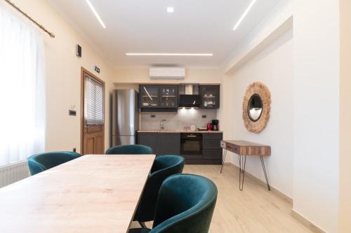Kuchyň nebo kuchyňský kout v ubytování ELEGANCE SUITES