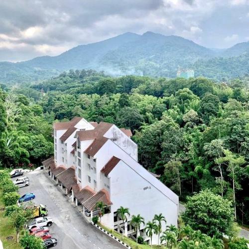 an aerial view of a building with a parking lot at The Oxford Suite in Bentong