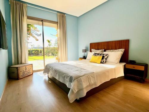 Voodi või voodid majutusasutuse Prestigia Golf Marrakech! Rez-de-jardin 2 chambres, grande terrasse et jardin, Piscine, Parking toas