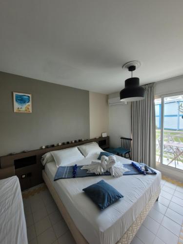 เตียงในห้องที่ Studio Bleu Sable