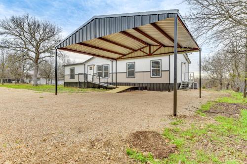 a shed with a basketball hoop in front of it at Hudson Oaks Country Creekside Home Hot Tub and Deck in Weatherford