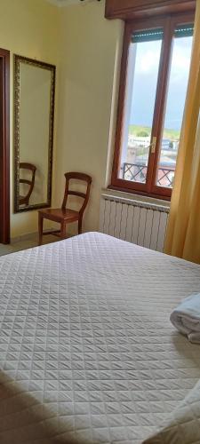 Postel nebo postele na pokoji v ubytování Hotel Colosseo Colleferro
