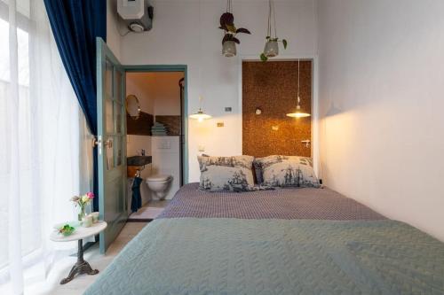 Postel nebo postele na pokoji v ubytování De Loods