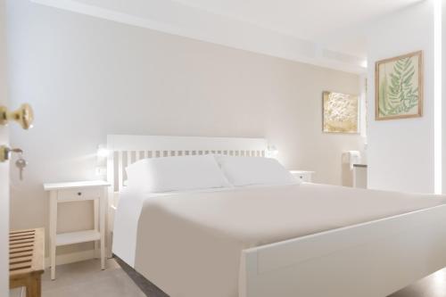 Postel nebo postele na pokoji v ubytování Le Sirene B&B