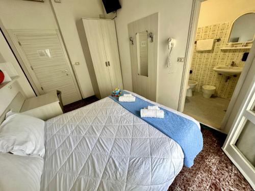 Posteľ alebo postele v izbe v ubytovaní Hotel Napoleon Leisure and Relax